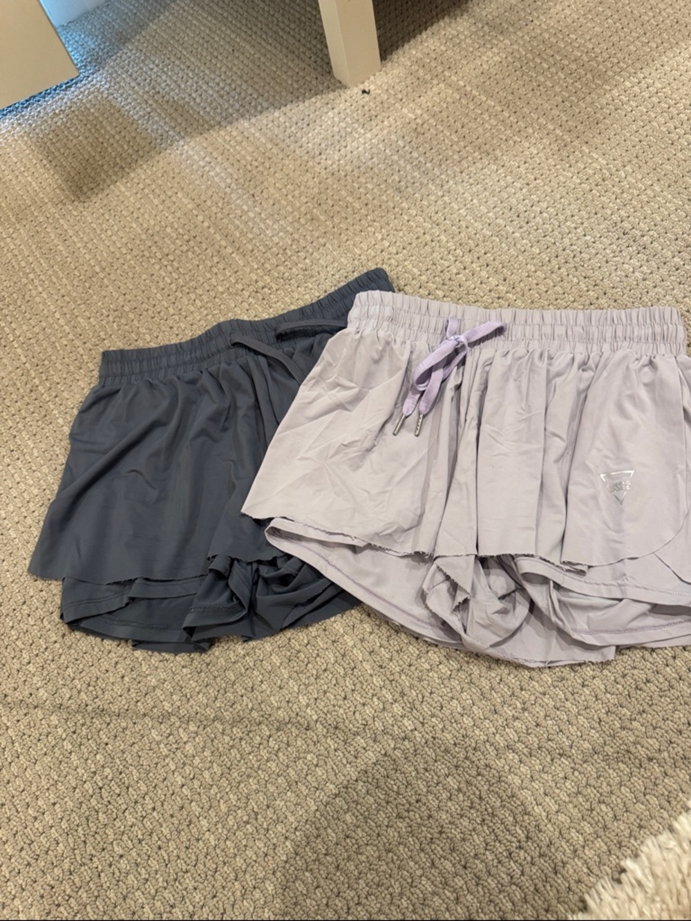 Light Purple and Dark Gray Women's Athletic Shorts - Unknown Brand
20$ for both